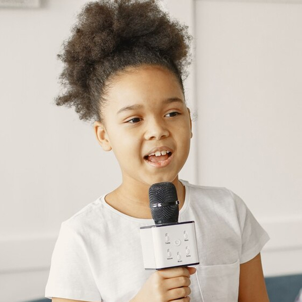 A young girl singing